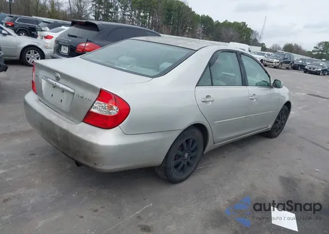 2003 Toyota Camry Le z USA, uszkodzony, nr VIN 4T1BE32K43U235052